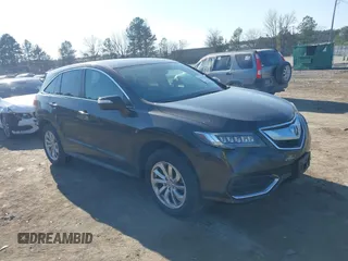 2016 Acura RDX with VIN 5J8TB4H36GL011656, listed as a IAAI auction lot 41421569 with 128,005 mi miles. Bid and sale history available at carsss.com. Image 1.