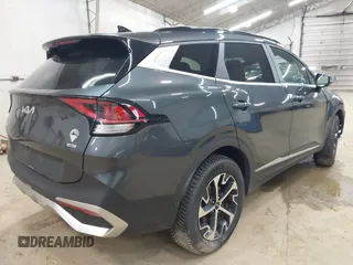 2023 Kia Sportage EX with VIN KNDPVCAG8P7040809, listed as a IAAI auction lot 42222979 with 55,345 mi miles and . Bid and sale history available at DreamBid. Image 4.