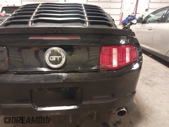 2011 Ford Mustang V6 with VIN 1ZVBP8AM4B5152094, listed as a IAAI auction lot 41763973 with 100,744 mi miles and . Bid and sale history available at carsss.com. Image 6.