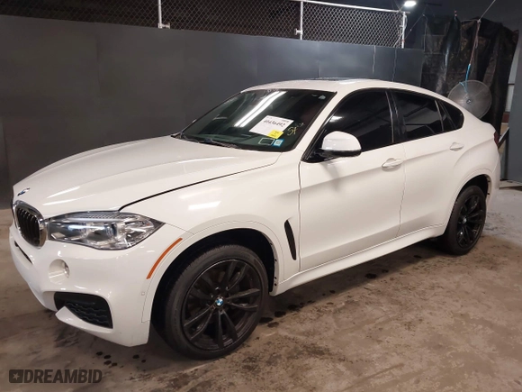 2019 BMW X6 sDrive35i with VIN 5UXKU0C5XK0S97686, listed as a IAAI auction lot 40436492 with 105,584 mi miles. Bid and sale history available at carsss.com. Image 17.