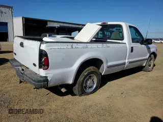 2001 Ford F-250 XL with VIN 1FTNF20L71EB45650, listed as a Copart auction lot 79976034 with 208,956 mi miles and Clean title. Bid and sale history available at DreamBid. Image 3.