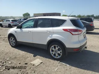 2013 Ford Escape SEL z VIN 1FMCU9H94DUC68911, wystawiony jako Copart lot #61671155 z przebiegiem 165 985 mil mil oraz Szkoda całkowita • Salvage title. Historia ofert i sprzedaży dostępna na DreamBid. Obrazek 2.