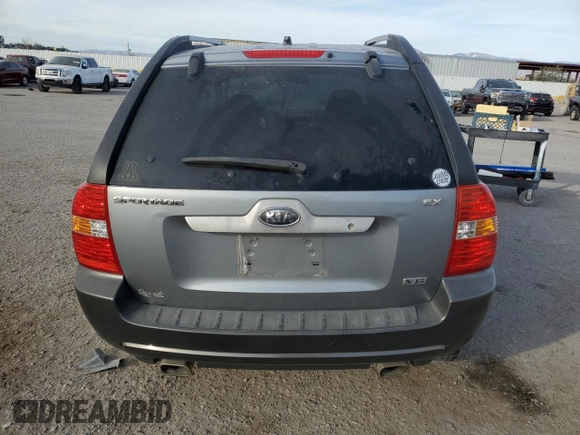 2005 Kia Sportage LX with VIN KNDJF723557124458, listed as a Copart auction lot 87089674 with Not Provided miles and Salvage Title. Bid and sale history available at carsss.com. Image 6.