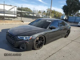 2023 Audi A8 with VIN WAULDAF85PN010277, listed as a Copart auction lot 74598694 with 12,497 mi miles and Salvage Title. Bid and sale history available at carsss.com. Image 1.