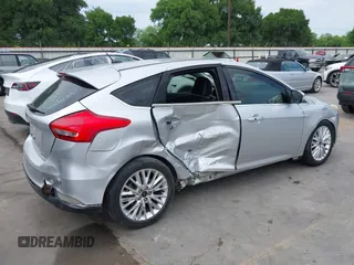 2015 Ford Focus Titanium with VIN 1FADP3N23FL356822, listed as a IAAI auction lot 41981053 with 115,584 mi miles and . Bid and sale history available at DreamBid. Image 6.