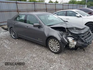 2011 Ford Fusion Hybrid with VIN 3FADP0L39BR345250, listed as a IAAI auction lot 42319401 with 321,317 mi miles and . Bid and sale history available at DreamBid. Image 1.