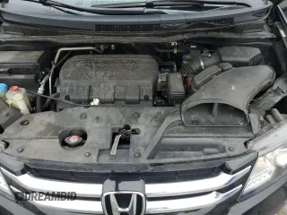 2015 Honda Odyssey Touring Elite z VIN 5FNRL5H93FB092682, wystawiony jako Copart lot #56884835 z przebiegiem 115 810 mil mil oraz Szkoda całkowita • Salvage title. Historia ofert i sprzedaży dostępna na DreamBid. Obrazek 12.
