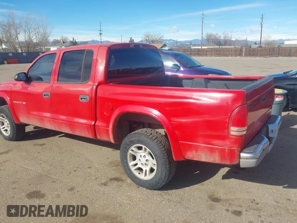 2002 Dodge Dakota SLT z VIN 1B7HG48N32S518455, wystawiony jako IAAI lot #41652316 z przebiegiem 234 856 mil mil oraz . Historia ofert i sprzedaży dostępna na DreamBid. Obrazek 3.
