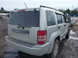 2009 Jeep Liberty Sport with VIN 1J8GN28K59W537290, listed as a IAAI auction lot 41642698 with 135,353 mi miles. Bid and sale history available at carsss.com. Image 4.