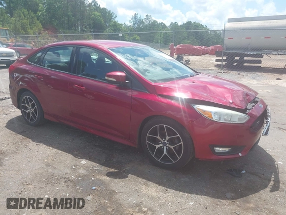 2015 Ford Focus SE z VIN 1FADP3F25FL313033, wystawiony jako IAAI lot #42206507 z przebiegiem 142 938 mil mil oraz . Historia ofert i sprzedaży dostępna na DreamBid. Obrazek 1.