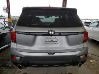 2024 Honda Passport EX-L z VIN 5FNYF8H55RB019867, wystawiony jako Copart lot #50025235 z przebiegiem 17 636 mil mil oraz Czysty tytuł • Clean title. Historia ofert i sprzedaży dostępna na DreamBid. Obrazek 6.