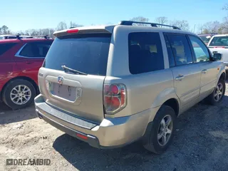 2006 Honda Pilot EX-L with RES with VIN 5FNYF28626B016118, listed as a IAAI auction lot 41819365 with 314,954 mi miles. Bid and sale history available at carsss.com. Image 4.