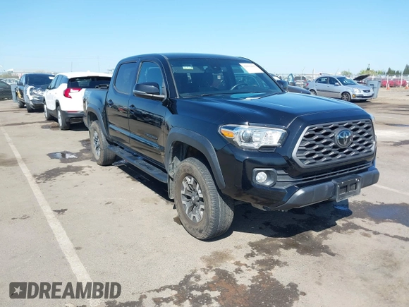 2021 Toyota Tacoma SR z VIN 3TMCZ5AN3MM421868, wystawiony jako IAAI lot #42003665 z przebiegiem 39 380 mil mil oraz . Historia ofert i sprzedaży dostępna na DreamBid. Obrazek 1.