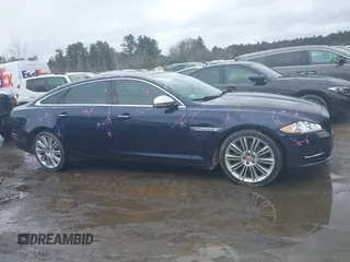 2015 Jaguar XJ Portfolio with VIN SAJWJ2GD0F8V83497, listed as a IAAI auction lot 41697285 with 52,311 mi miles and . Bid and sale history available at DreamBid. Image 13.