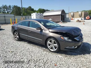 2013 Volkswagen CC Sport Plus z VIN WVWBP7AN7DE515951, wystawiony jako Copart lot #52251575 z przebiegiem 121 414 mil mil oraz Szkody całkowita. Historia ofert i sprzedaży dostępna na DreamBid. Obrazek 4.