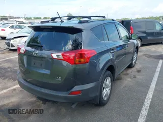 2015 Toyota RAV4 LE with VIN JTMBFREV4FD165163, listed as a IAAI auction lot 42638608 with 188,083 mi miles and . Bid and sale history available at DreamBid. Image 4.
