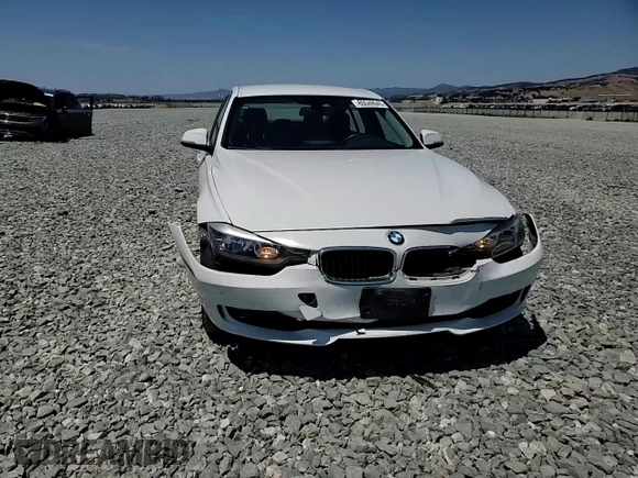 2014 BMW 3 Series 320i with VIN WBA3B1C55EK133687, listed as a Copart auction lot 63049945 with 95,604 mi miles and Salvage title. Bid and sale history available at DreamBid. Image 13.