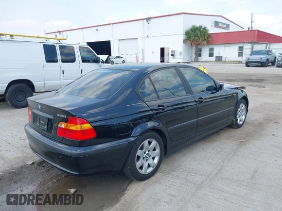 2002 BMW 3 Series 325i with VIN WBAET37412NG78995, listed as a IAAI auction lot 41965274 with 131,138 mi miles. Bid and sale history available at carsss.com. Image 4.