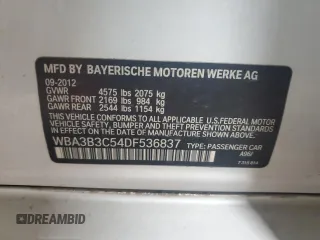 2013 BMW 3 Series 328i xDrive with VIN WBA3B3C54DF536837, listed as a Copart auction lot 62305215 with 289,839 mi miles and Salvage title. Bid and sale history available at DreamBid. Image 13.