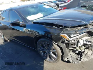 2022 Acura TLX w/A-Spec Package with VIN 19UUB6F52NA001283, listed as a IAAI auction lot 41247811 with 22,214 mi miles and . Bid and sale history available at DreamBid. Image 1.