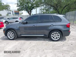 2012 BMW X5 35i z VIN 5UXZV4C5XCL990728, wystawiony jako IAAI lot #42386095 z przebiegiem 124 613 mil mil oraz . Historia ofert i sprzedaży dostępna na DreamBid. Obrazek 14.