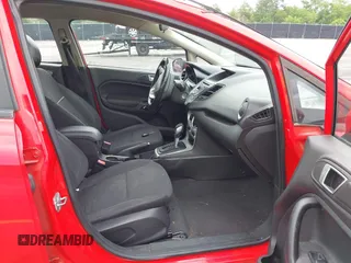 2014 Ford Fiesta SE with VIN 3FADP4BJ7EM205299, listed as a IAAI auction lot 42109032 with 145,797 mi miles. Bid and sale history available at carsss.com. Image 5.