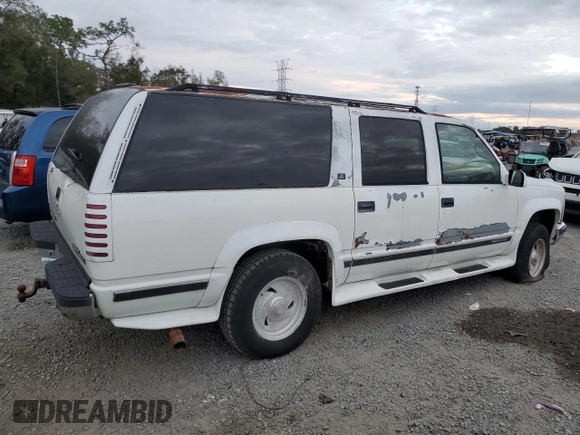 1995 GMC Suburban z VIN 1GKFK16K3SJ704911, wystawiony jako Copart lot #88326825 z przebiegiem 191 006 mil mil oraz Szkoda całkowita • Salvage title. Historia ofert i sprzedaży dostępna na DreamBid. Obrazek 3.