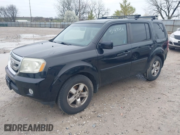 2011 Honda Pilot EX-L with VIN 5FNYF4H6XBB004269, listed as a IAAI auction lot 41947036 with 184,390 mi miles and . Bid and sale history available at carsss.com. Image 2.