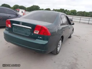 2001 Honda Civic LX with VIN 2HGES16571H570682, listed as a IAAI auction lot 42051409 with 229,962 mi miles. Bid and sale history available at carsss.com. Image 4.