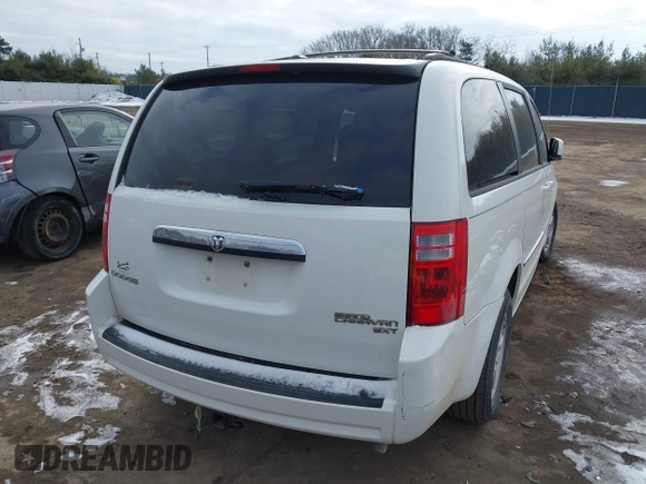 2010 Dodge Grand Caravan SXT with VIN 2D4RN5D18AR218903, listed as a IAAI auction lot 41560484 with Not Provided miles and . Bid and sale history available at DreamBid. Image 4.