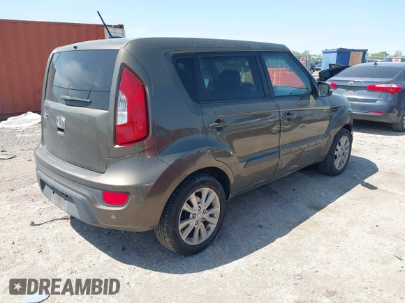 2012 Kia Soul + with VIN KNDJT2A69C7403710, listed as a IAAI auction lot 41916201 with 163,064 mi miles. Bid and sale history available at carsss.com. Image 4.