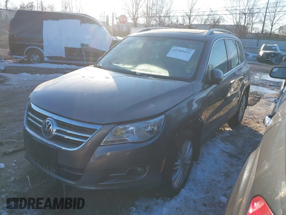2010 Volkswagen Tiguan SEL with VIN WVGBV7AX0AW000279, listed as a IAAI auction lot 41389452 with 87,258 mi miles and . Bid and sale history available at DreamBid. Image 2.