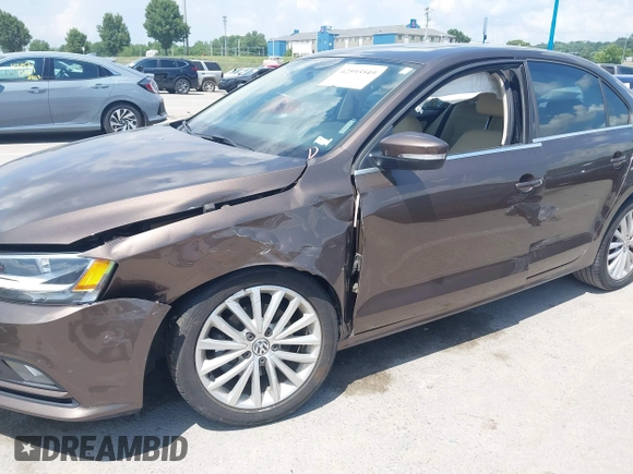 2015 Volkswagen Jetta SE with VIN 3VWD07AJ0FM214295, listed as a IAAI auction lot 42593549 with 62,720 mi miles and . Bid and sale history available at DreamBid. Image 6.