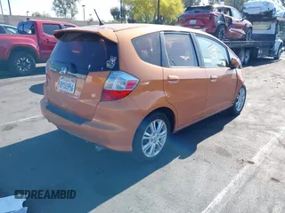 2011 Honda Fit Sport z VIN JHMGE8H59BS008957, wystawiony jako IAAI lot #42360019 z przebiegiem 158 975 mil mil oraz . Historia ofert i sprzedaży dostępna na DreamBid. Obrazek 4.