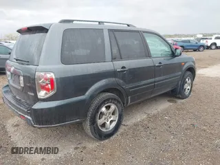 2006 Honda Pilot EX with VIN 2HKYF18426H502390, listed as a IAAI auction lot 42146354 with 164,937 mi miles and . Bid and sale history available at DreamBid. Image 4.