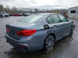 2018 BMW 5 Series 540i xDrive with VIN WBAJE7C52JWC57407, listed as a IAAI auction lot 41805890 with 112,151 mi miles and . Bid and sale history available at DreamBid. Image 4.