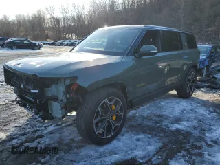 2022 Rivian R1S Launch Edition with VIN 7PDSGABL7NN001313, listed as a Copart auction lot 44277345 with 11,977 mi miles and Salvage Title. Bid and sale history available at carsss.com. Image 1.