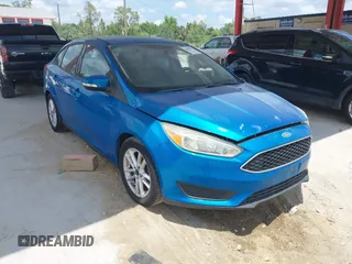 2015 Ford Focus SE with VIN 1FADP3F2XFL354354, listed as a IAAI auction lot 42183319 with 102,232 mi miles and . Bid and sale history available at carsss.com. Image 1.