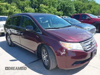 2011 Honda Odyssey EX-L with VIN 5FNRL5H60BB094647, listed as a IAAI auction lot 42223712 with 202,612 mi miles and . Bid and sale history available at carsss.com. Image 1.