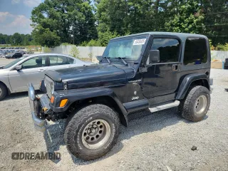 2001 Jeep Wrangler Sport z VIN 1J4FA49S91P347090, wystawiony jako Copart lot #60436405 z przebiegiem 141 172 mil mil oraz Szkoda całkowita • Salvage title. Historia ofert i sprzedaży dostępna na DreamBid. Obrazek 1.