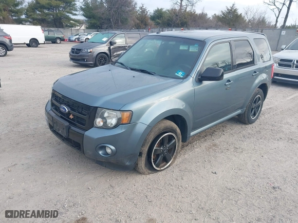 2011 Ford Escape XLT with VIN 1FMCU9DG9BKC38929, listed as a IAAI auction lot 41784854 with 216,201 mi miles. Bid and sale history available at carsss.com. Image 2.