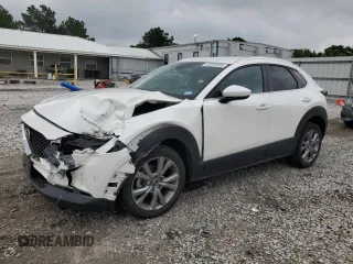 2022 Mazda CX-30 S Select with VIN 3MVDMBBL3NM430469, listed as a Copart auction lot 57291085 with 33,876 mi miles and Salvage title. Bid and sale history available at DreamBid. Image 1.