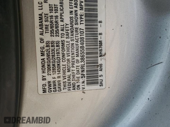 2005 Honda Odyssey EX-L z VIN 5FNRL38655B408107, wystawiony jako Copart lot #50918155 z przebiegiem 215 920 mil mil oraz Szkoda całkowita • Salvage title. Historia ofert i sprzedaży dostępna na DreamBid. Obrazek 13.