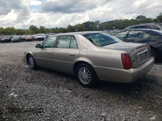 2004 Cadillac DeVille DHS z VIN 1G6KE57Y74U116879, wystawiony jako Copart lot #71017214 z przebiegiem 130 169 mil mil oraz Szkoda całkowita • Salvage title. Historia ofert i sprzedaży dostępna na DreamBid. Obrazek 2.