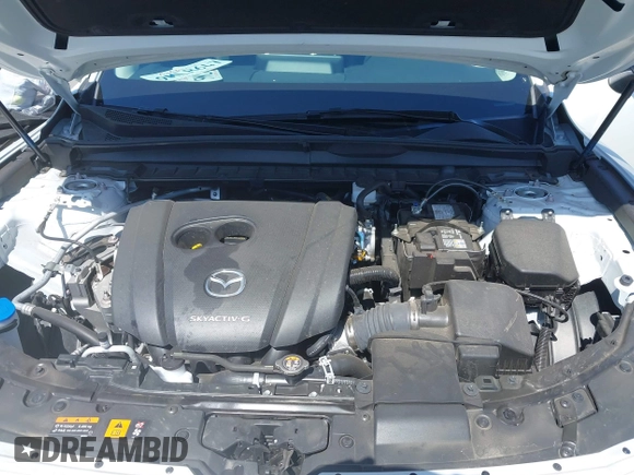 2024 Mazda CX-50 S Select with VIN 7MMVABAM6RN215530, listed as a IAAI auction lot 42250974 with 9,940 mi miles and . Bid and sale history available at DreamBid. Image 10.