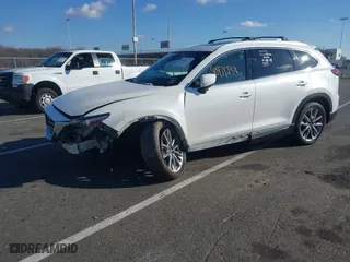 2018 Mazda CX-9 Grand Touring with VIN JM3TCBDY6J0200843, listed as a IAAI auction lot 40971233 with 94,770 mi miles. Bid and sale history available at carsss.com. Image 2.