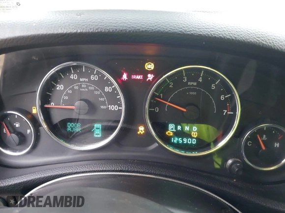 2013 Jeep Wrangler Rubicon 10th Anniversary with VIN 1C4BJWCG7DL544145, listed as a IAAI auction lot 41965259 with 125,900 mi miles and . Bid and sale history available at carsss.com. Image 7.