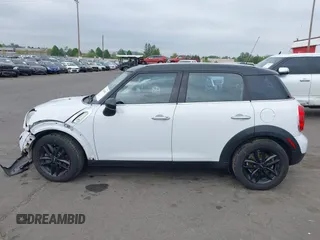 2012 MINI Countryman with VIN WMWZB3C57CWM04258, listed as a IAAI auction lot 42116867 with 168,550 mi miles and . Bid and sale history available at DreamBid. Image 14.