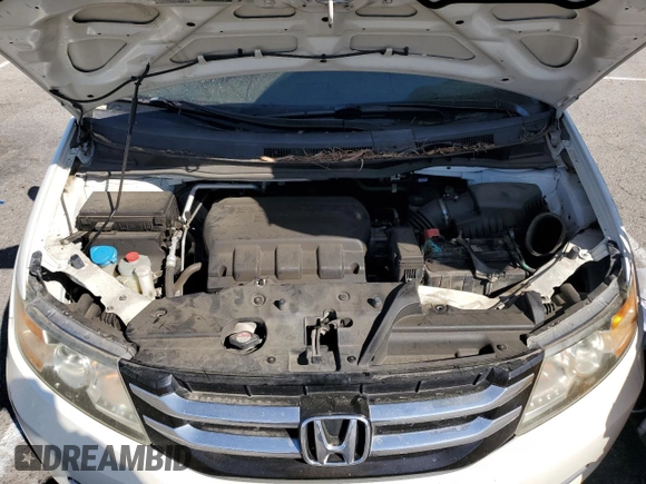 2014 Honda Odyssey EX-L with VIN 5FNRL5H6XEB060557, listed as a Copart auction lot 47141835 with 214,718 mi miles and Clean Title. Bid and sale history available at DreamBid. Image 12.