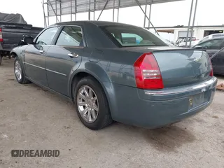 2006 Chrysler 300 C with VIN 2C3KA63H66H318725, listed as a IAAI auction lot 41629398 with 157,367 mi miles. Bid and sale history available at carsss.com. Image 3.